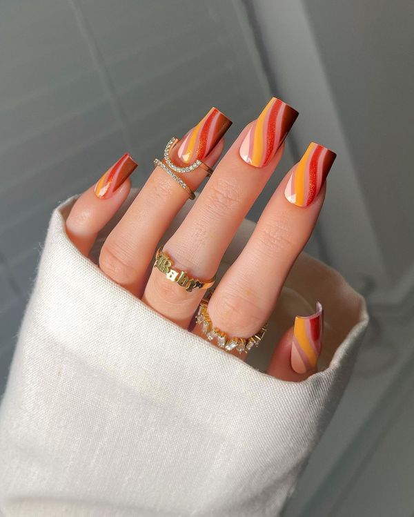 Different Shades of Orange Wavy Nails