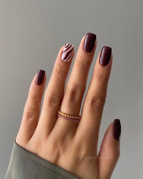 Burgundy Nails with Zebra Print Ring Finger Design