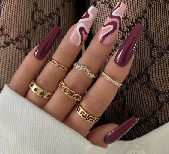 White and Burgundy Swirl Nails