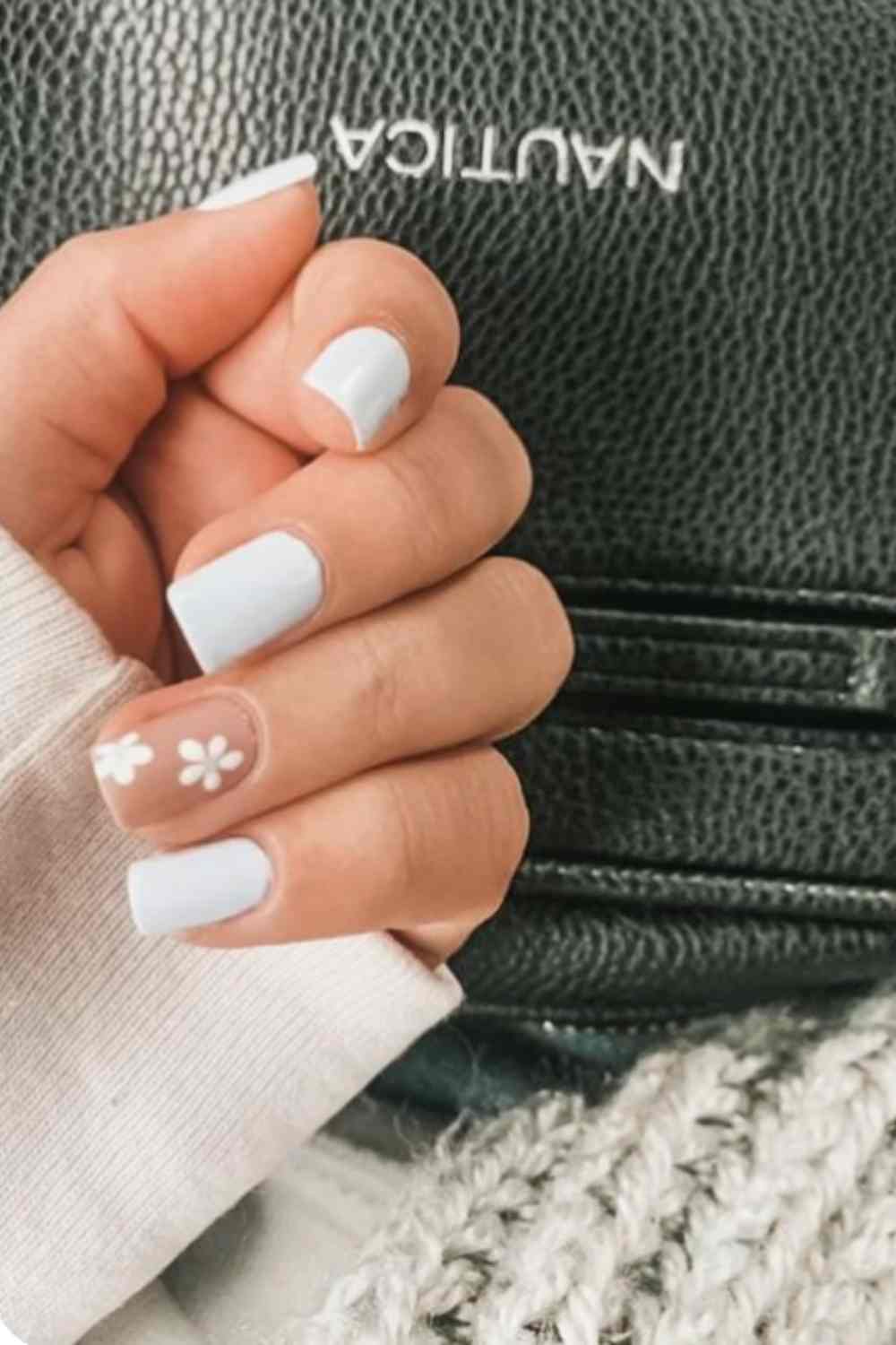 Simple white floral nail design