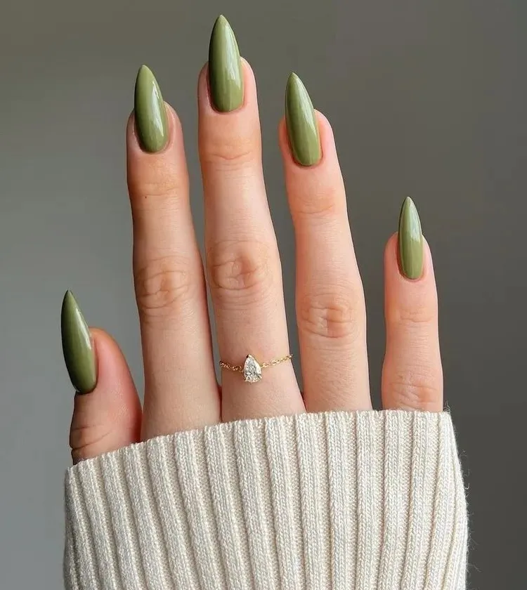 olive green nail art on long stiletto nails