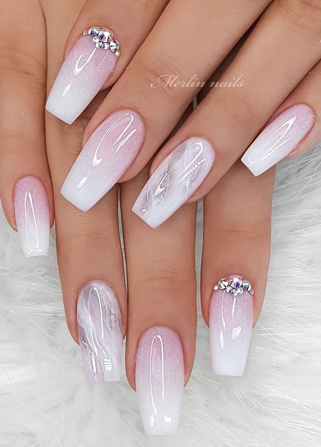 Elegant white baby boomer nails.