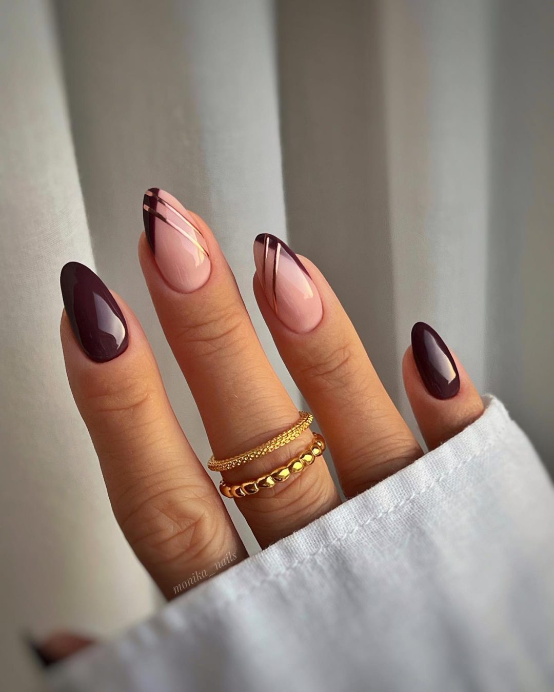 Elegant burgundy nails.