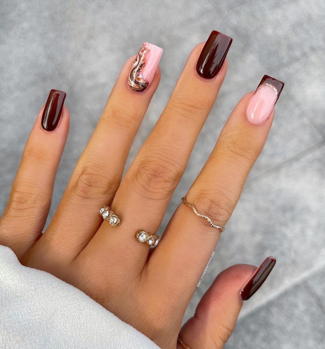 Elegant burgundy nails with French tips.