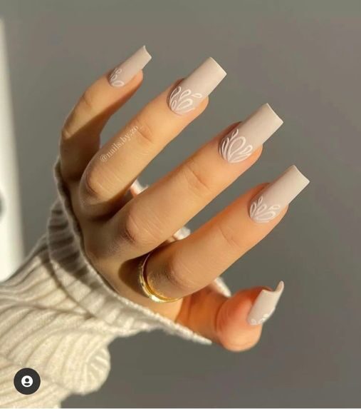 Cream square nails with abstract design