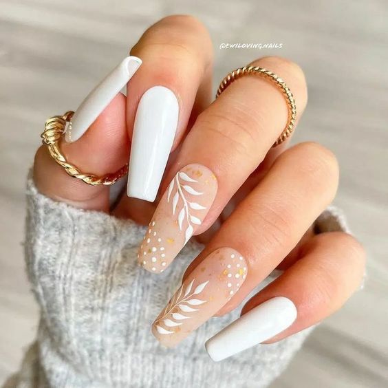 Cream color coffin nails with leaves