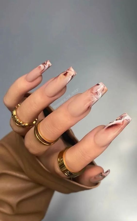 Brown marble French tips nail art