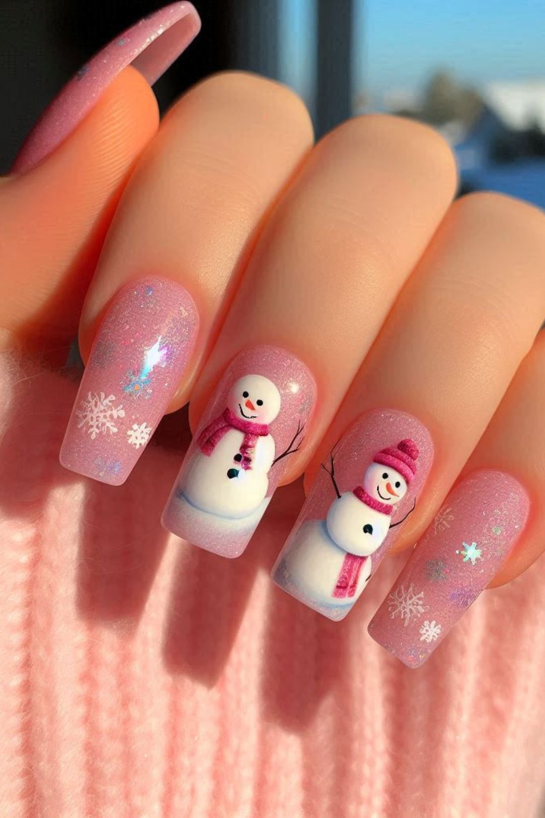 This Christmas, pink is making a splash as a standout fashion trend, and your nails are no exception!  Embrace the holiday spirit with one of these 21 stylish pink Christmas nail designs.  Gold, white, cute, short, simple, red, girly, silver, easy, classy, snowflake, bow, long, subtle, santa hat, and white, and red, glitter, and gold, and white glitter, and green, almond, and silver, and blue.