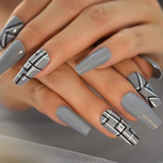 Glossy gray nails with abstract nail art