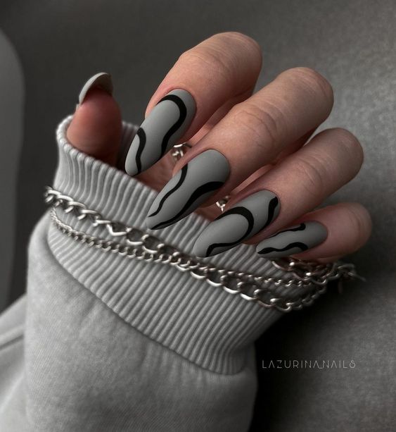 Matte grey nails with abstract design