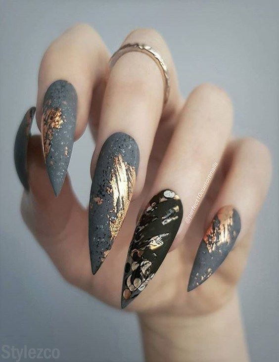 Matte stiletto grey nails with gold flakes