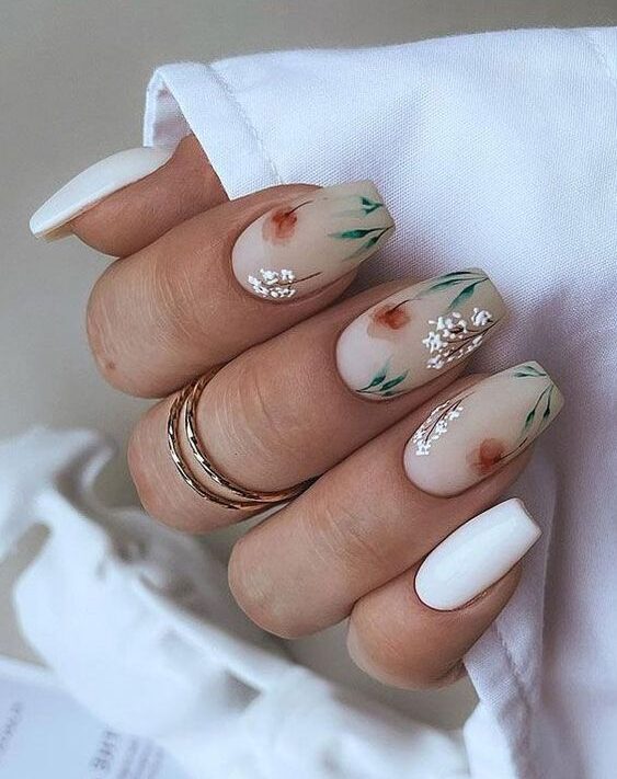 Square beige nails with flowers