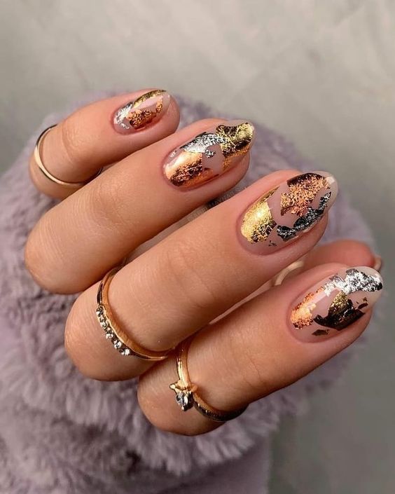 Gold flakes on clear round nails