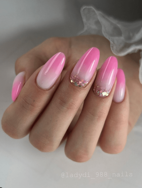 pink glitter nails. pink nails almond. barbiecore nails