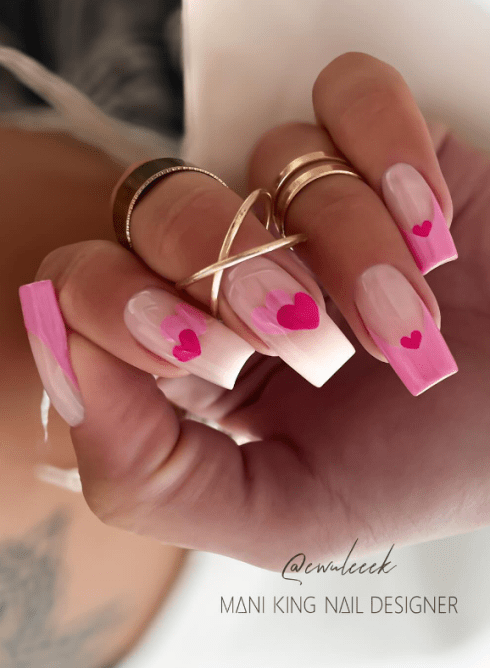 pink heart nail art. pink heart valentines day nails. pink nails. pink acrylic nails.