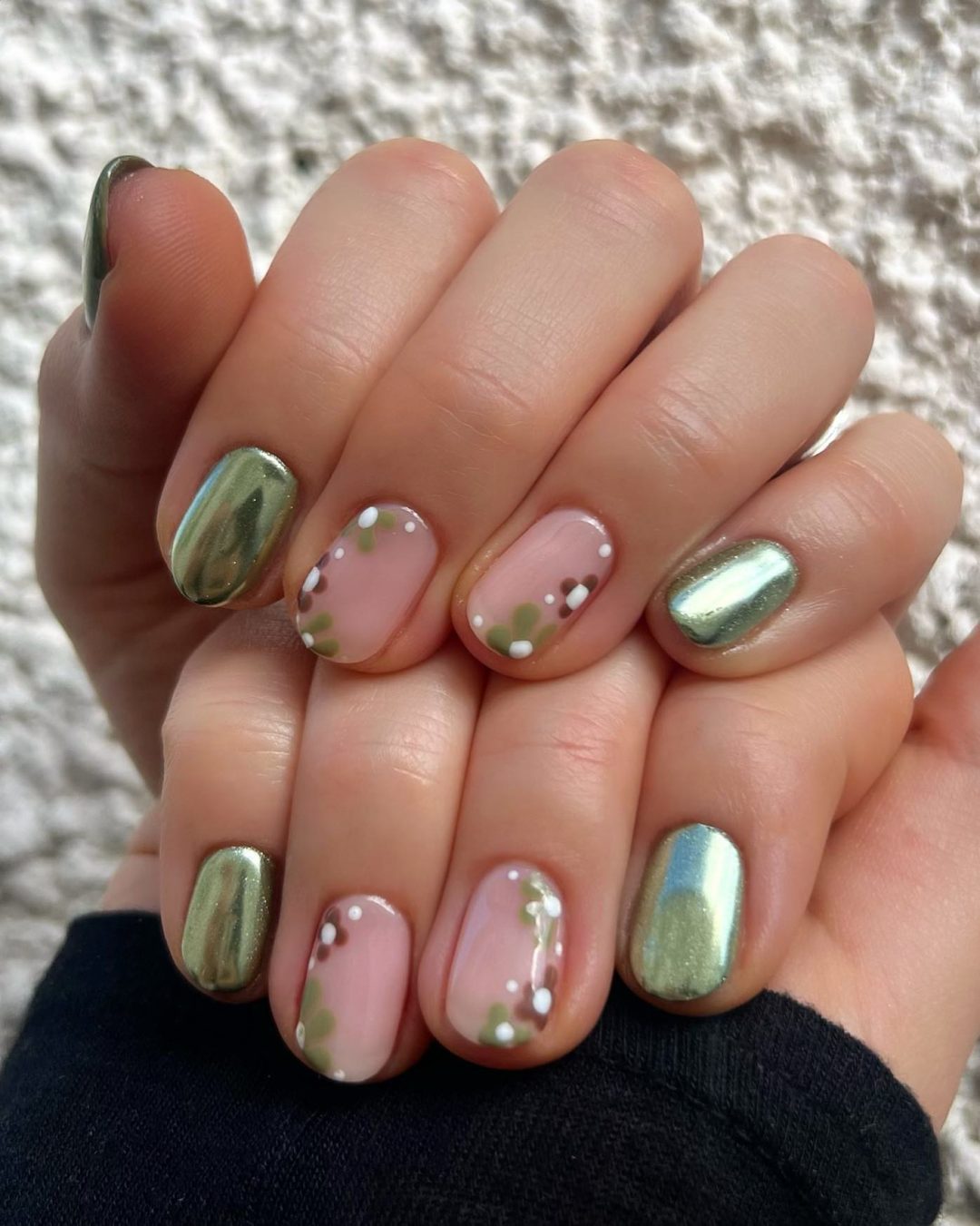 Short sage green chrome nails.