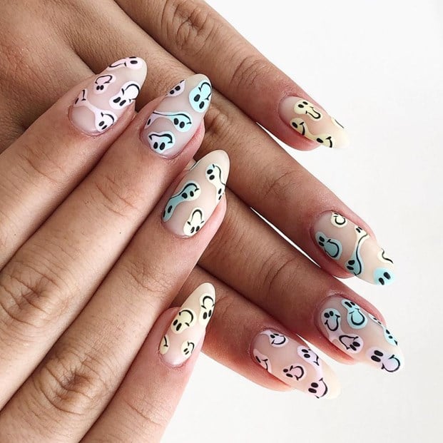 Almond nails with pastel smiley nail art