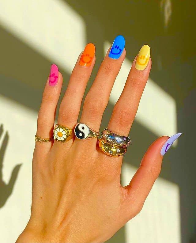 Colorful rainbow smiley face nails