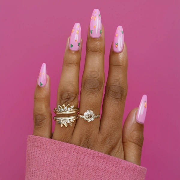 Pink nails with detailed strawberry