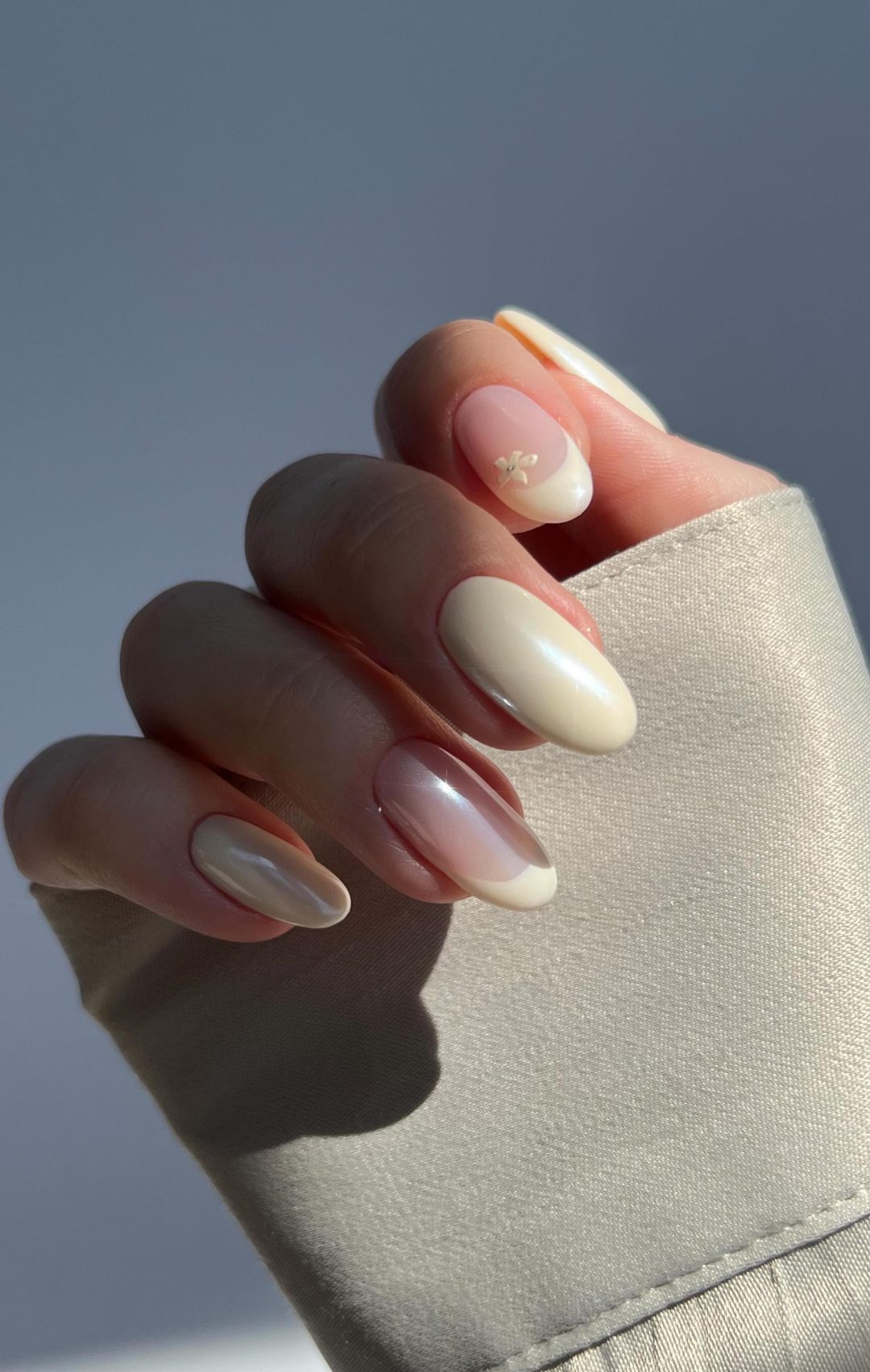 Cream white French tip nails.