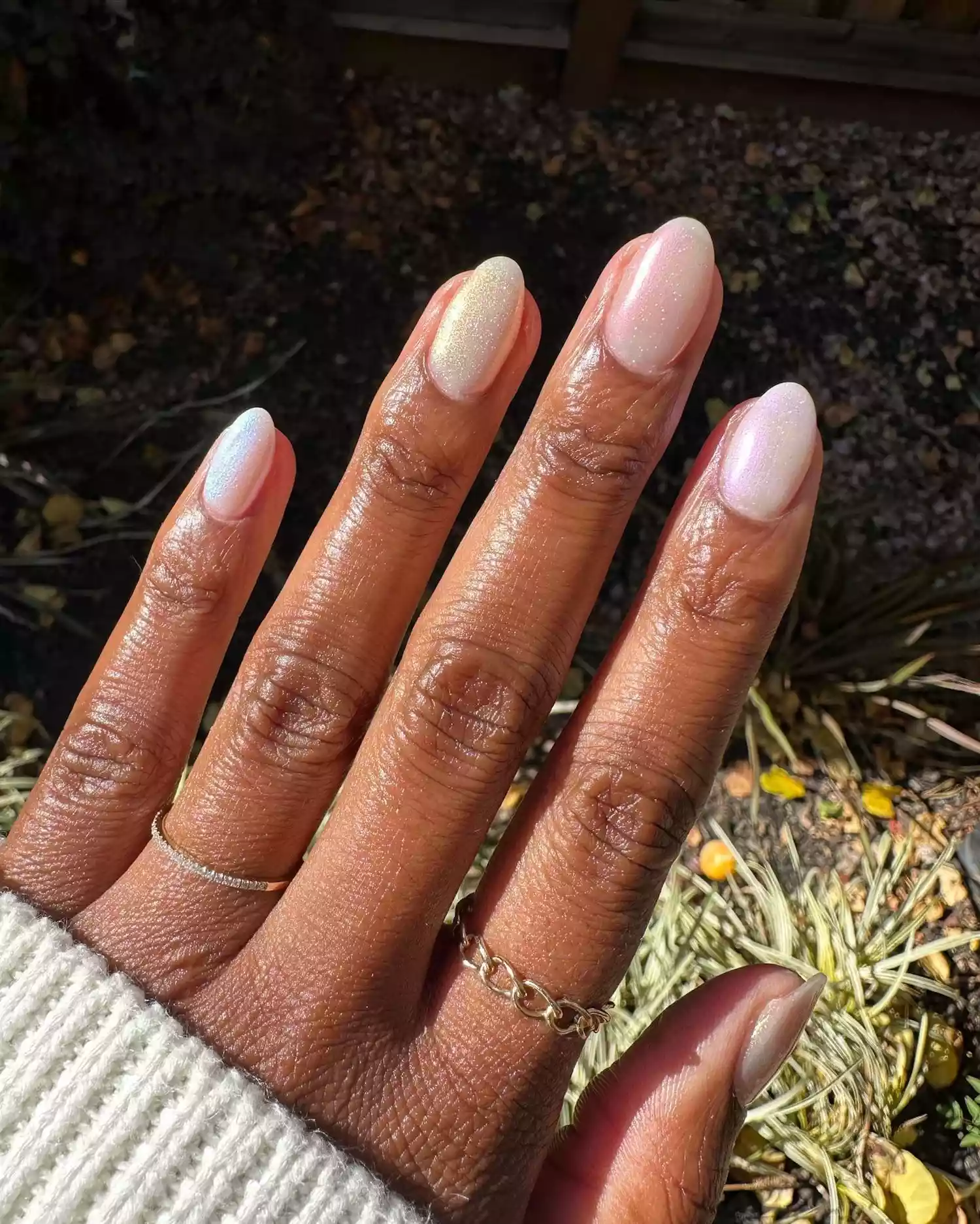 Close up of a chrome fairy manicure