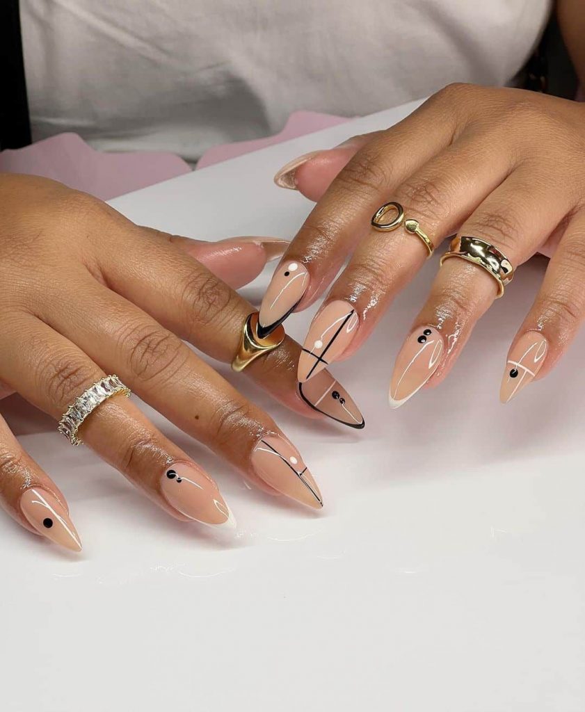 Classy & Stylish: How to Flaunt Pink Almond Nails on Dark Skin