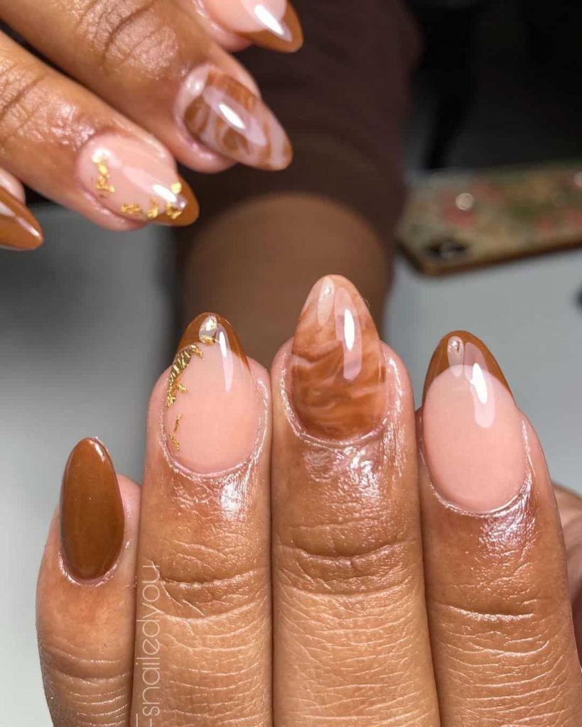 Classy & Stylish: How to Flaunt Pink Almond Nails on Dark Skin