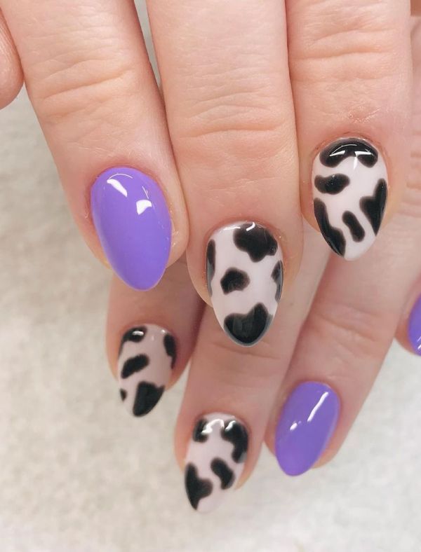 11. Stiletto Mauve and Cow Print Nails