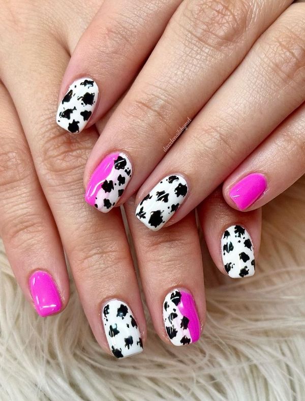 8. Hot Pink and Cow Print Nails